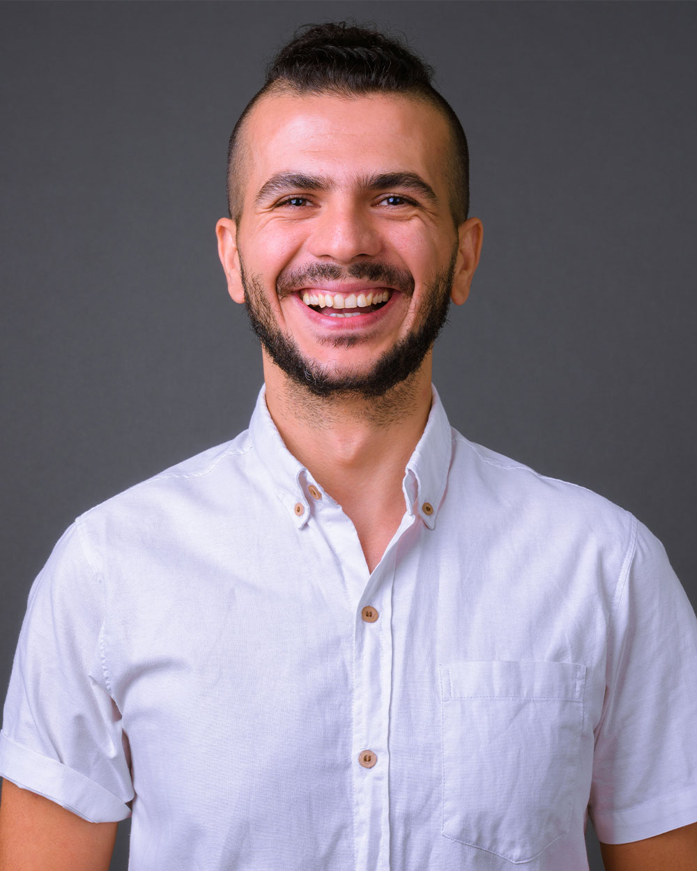 portrait of happy handsome bearded turkish man smi L5DJ897